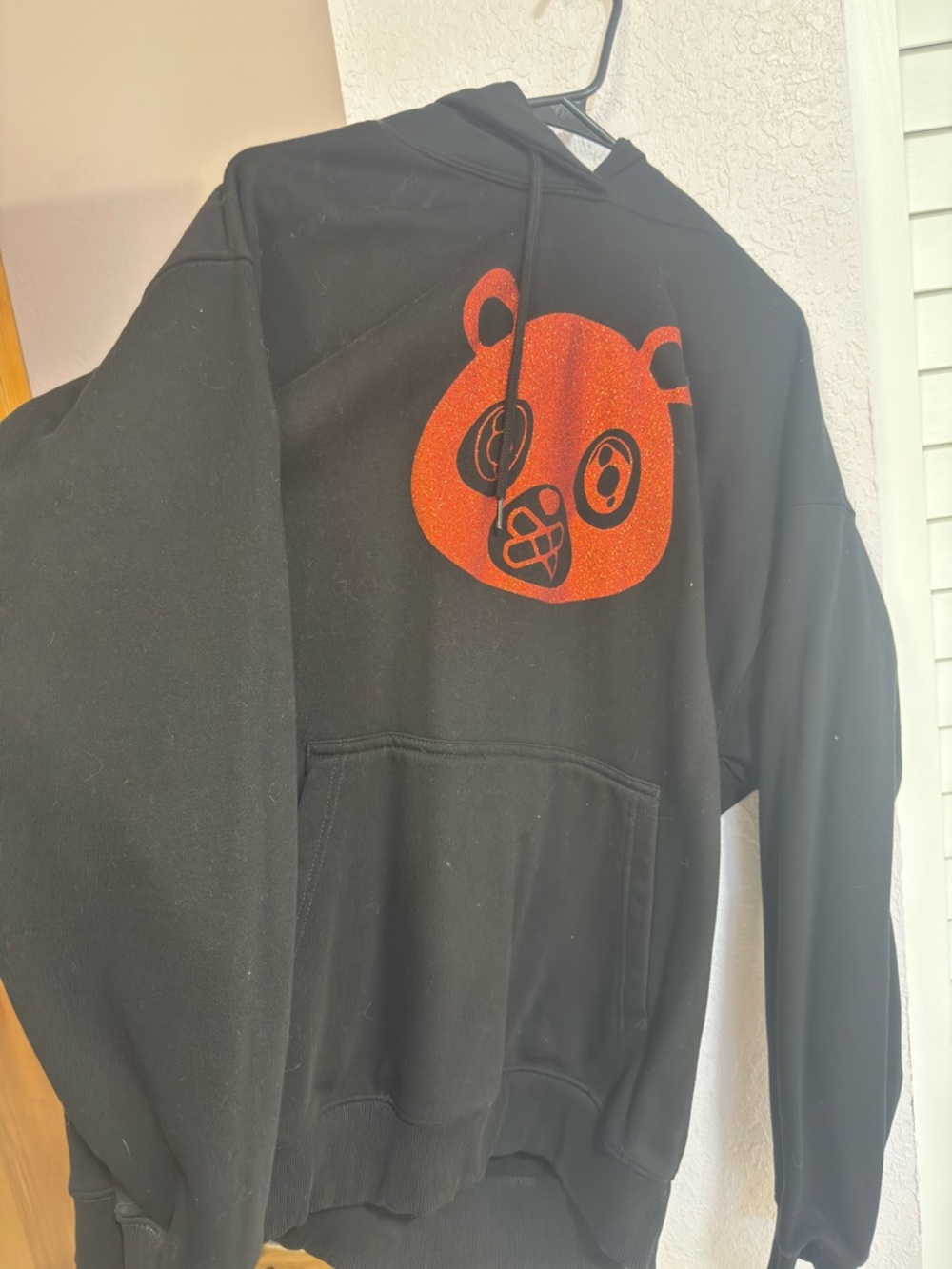 Black Hoodie with Red Bear Graphic